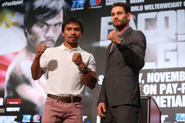 MACAU - NOVEMBER 19:  Manny Pacquiao and Chris Algieri pose during a press conference at The Venetian on November 19, 2014 in Macau, Macau.  (Photo by Chris Hyde/Getty Images)