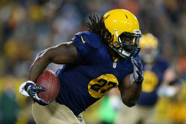 GREEN BAY, WI - NOVEMBER 16:   Eddie Lacy #27 of the Green Bay Packers runs the ball against the Philadelphia Eagles during the second quarter of the game at Lambeau Field on November 16, 2014 in Green Bay, Wisconsin.  (Photo by Ronald Martinez/Getty Images)