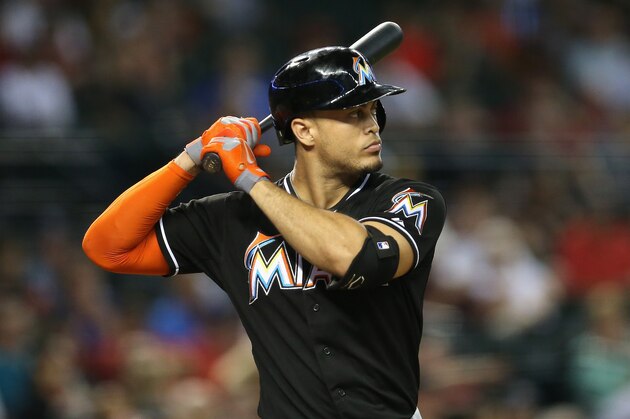 PHOENIX, AZ - JULY 07:  Giancarlo Stanton #27 of the Miami Marlins bats against the Arizona Diamondbacks during the MLB game at Chase Field on July 7, 2014 in Phoenix, Arizona.  (Photo by Christian Petersen/Getty Images)