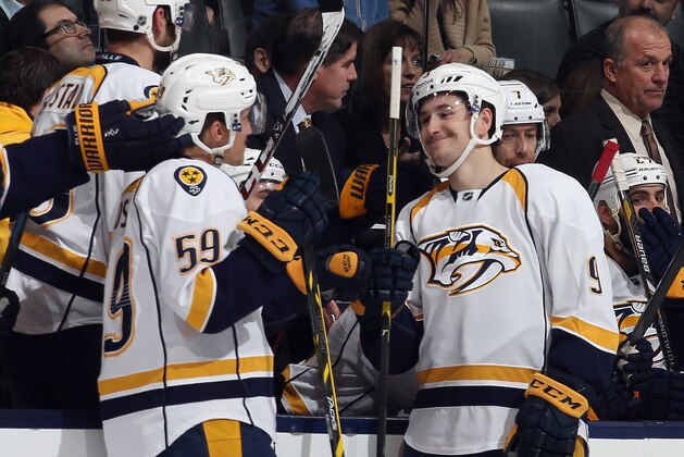 TORONTO, ON - NOVEMBER 18: Filip Forsberg #9 of the Nashville Predators celebrates his goal at 1:26 of the third period against the Toronto Maple Leafs and is joined by Roman Josi #59 at the Air Canada Centre on November 18, 2014 in Toronto, Canada. The Predators defeated the Leafs 9-2. (Photo by Bruce Bennett/Getty Images)