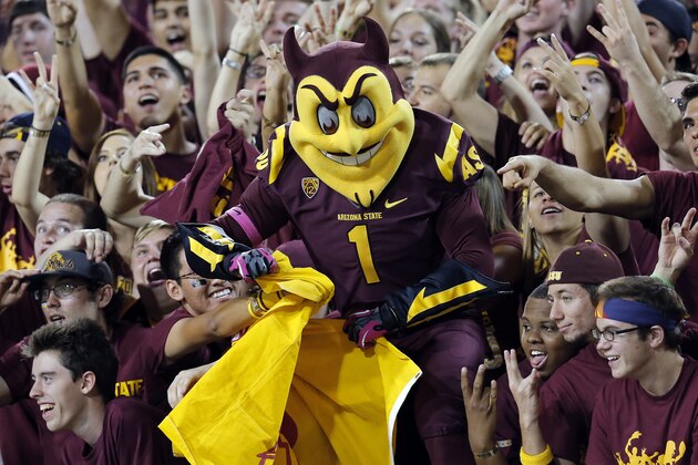 Arizona State mascot Sparky celebrates with fans against Stanford during the second half of the NCAA college football game, Saturday, Oct. 18, 2014, in Tempe, Ariz. (AP Photo/Rick Scuteri)