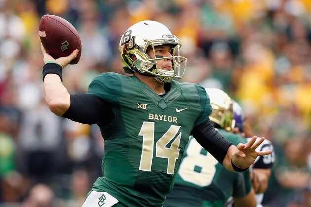 WACO, TX - OCTOBER 11:  Bryce Petty #14 of the Baylor Bears looks for an open receiver in the first half against the TCU Horned Frogs at McLane Stadium on October 11, 2014 in Waco, Texas.  (Photo by Tom Pennington/Getty Images)