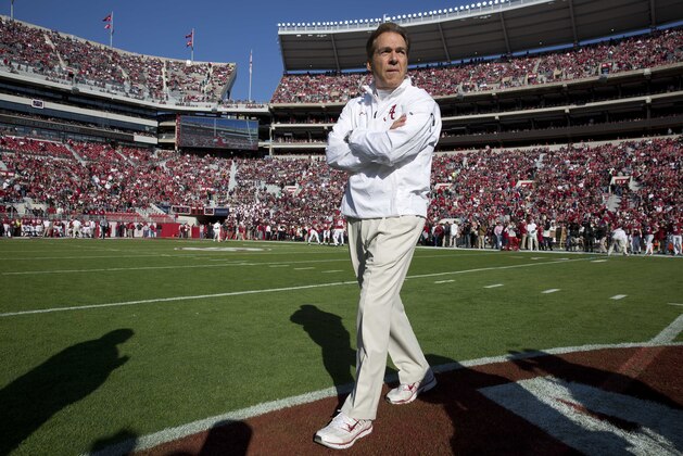 Alabama head coach Nick Saban walks the field before an NCAA college football game against Mississippi State,  Saturday, Nov. 15, 2014, in Tuscaloosa, Ala. (AP Photo/Brynn Anderson)