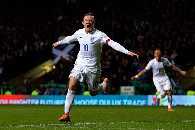 GLASGOW, SCOTLAND - NOVEMBER 18:  Wayne Rooney of England celebrates after scoring his team's third goal during the International Friendly match between Scotland and England at Celtic Park Stadium on November 18, 2014 in Glasgow, Scotland.  (Photo by Alex Livesey/Getty Images)