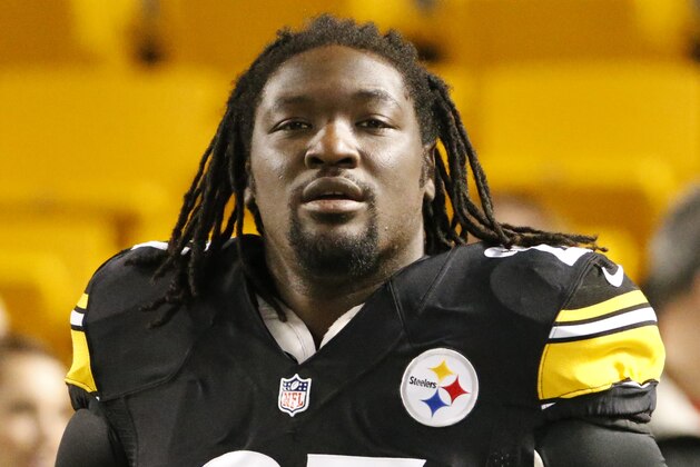 FILE - In this Oct. 20, 2014, file photo, Pittsburgh Steelers running back LeGarrette Blount (27) warms up before an  NFL football game against the Houston Texans in Pittsburgh. The Steelers have released running back LeGarrette Blount. The move comes less than 24 hours after Blount left the field early in a victory over the Tennessee Titans on Monday night, Nov. 17. (AP Photo/Gene J. Puskar, File)