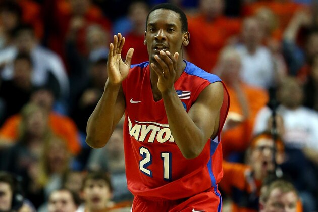 BUFFALO, NY - MARCH 22: Dyshawn Pierre #21 of the Dayton Flyers reacts against the Syracuse Orange during the third round of the 2014 NCAA Men's Basketball Tournament at the First Niagara Center on March 22, 2014 in Buffalo, New York.  (Photo by Elsa/Getty Images)