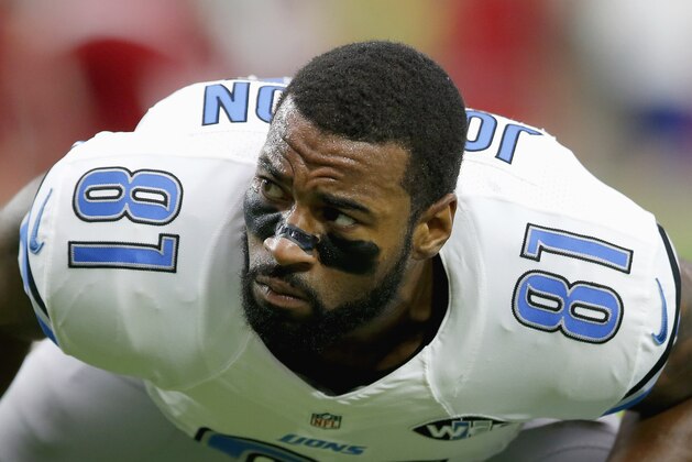 Detroit Lions' Calvin Johnson stretches out prior to an NFL football game against the Arizona Cardinals, Sunday, Nov. 16, 2014, in Glendale, Ariz. (AP Photo/Ross D. Franklin)