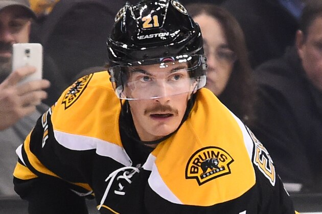 BOSTON, MA - NOVEMBER 18 : Loui Eriksson #21 of the Boston Bruins skates with the puck against the St. Louis Blues at the TD Garden on November 18, 2014 in Boston, Massachusetts.  (Photo by Brian Babineau/NHLI via Getty Images)