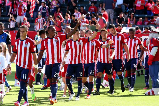 LOS ANGELES, CA - OCTOBER 26:  Chivas USA players wave to the fans as they take the field before playing the San Jose Earthquakes at StubHub Center on October 26, 2014 in Los Angeles, California.  The game was the team's last as Chivas USA as they face an uncertain future.  (Photo by Stephen Dunn/Getty Images)