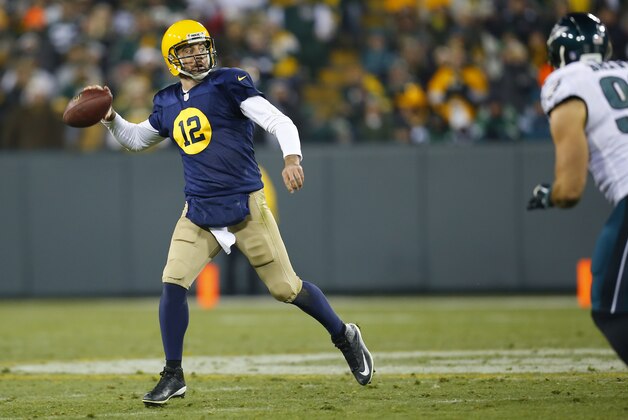 Green Bay Packers quarterback Aaron Rodgers (12) throws a pass against the Philadelphia Eagles during an NFL football game on Sunday, Nov. 16, 2014 in Green Bay, Wis. The Packers won the game 53-20. (Jeff Haynes/AP Images for Panini)