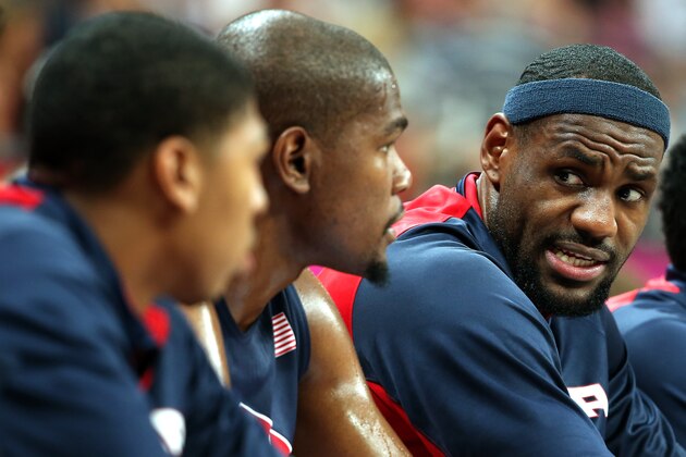 LONDON, ENGLAND - JULY 31:  LeBron James #6 of United States looks over at teammates Kevin Durant #5 and Anthony Davis #14 during the Men's Basketball Preliminary Round match on Day 4 of the London 2012 Olympic Games at Basketball Arena on July 31, 2012 in London, England.  (Photo by Christian Petersen/Getty Images)