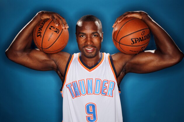 OKLAHOMA CITY, OK - SEPTEMBER 29: Serge Ibaka #9 of the Oklahoma City Thunder poses for a portrait during 2014 NBA Media Day on September 29, 2014 at the Thunder Events Center in Edmond, Oklahoma. NOTE TO USER: User expressly acknowledges and agrees that, by downloading and or using this Photograph, user is consenting to the terms and conditions of the Getty Images License Agreement. Mandatory Copyright Notice: Copyright 2014 NBAE (Photo by Layne Murdoch/NBAE via Getty Images)