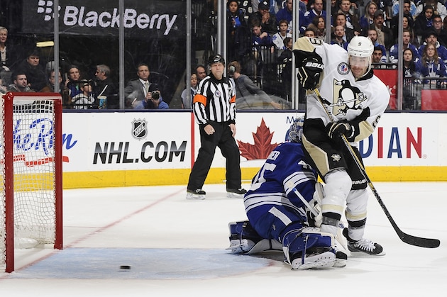 TORONTO, ON - NOVEMBER 14:  Pascal Dupuis #9 of the Pittsburgh Penguins scores a second period goal on Jonathan Bernier #45 of the Toronto Maple Leafs during NHL game action November 14, 2014 at the Air Canada Centre in Toronto, Ontario, Canada. (Photo by Graig Abel/NHLI via Getty Images)