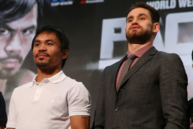 MACAU - NOVEMBER 19:  Manny Pacquiao and Chris Algieri pose during a press conference at The Venetian on November 19, 2014 in Macau, Macau.  (Photo by Chris Hyde/Getty Images)