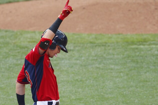 United States' Jesse Winker reacts after hitting a double during the third inning of the All-Star Futures baseball game against the World Team, Sunday, July 13, 2014, in Minneapolis. (AP Photo/Paul Sancya)