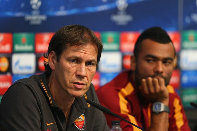 MANCHESTER, ENGLAND - SEPTEMBER 29:  Rudi Garcia the coach of AS Roma and Ashley Cole face the media during a press conference at Etihad Stadium on September 29, 2014 in Manchester, England.  (Photo by Alex Livesey/Getty Images)
