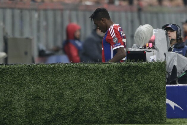 Bayern's David Alaba from Austria leaves the pitch during the Champions League Group E soccer match between FC Bayern Munich and AS Roma at Allianz Arena in Munich, southern Germany, Wednesday Nov. 5, 2014. (AP Photo/Matthias Schrader)