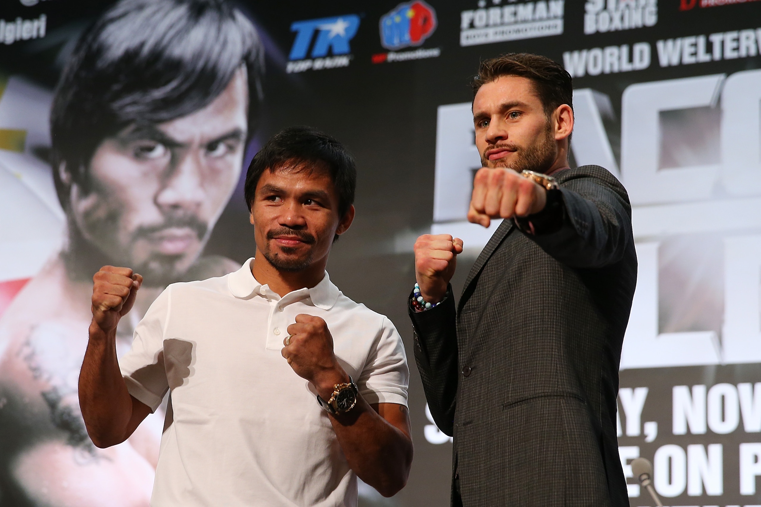 MACAU - NOVEMBER 19:  Manny Pacquiao and Chris Algieri pose during a press conference at The Venetian on November 19, 2014 in Macau, Macau.  (Photo by Chris Hyde/Getty Images)