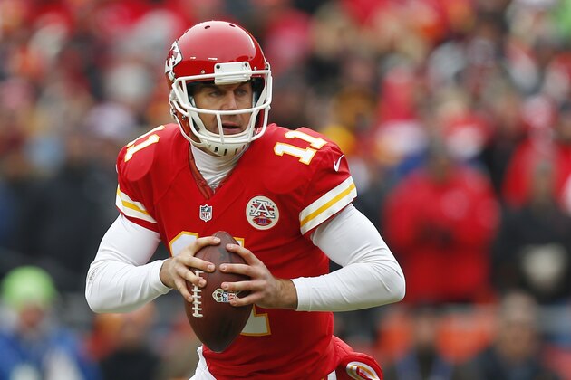 Kansas City Chiefs quarterback Alex Smith (11) looks to pass in the first half of an NFL football game against the Seattle Seahawks in Kansas City, Mo., Sunday, Nov. 16, 2014. (AP Photo/Ed Zurga)