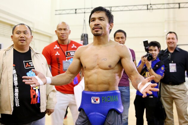 MACAU - NOVEMBER 20:  Manny Pacquiao trains during a workout session at The Venetian on November 20, 2014 in Macau, Macau.  (Photo by Chris Hyde/Getty Images)