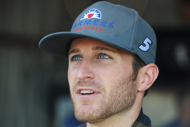 RICHMOND, VA - SEPTEMBER 05:  Kasey Kahne, driver of the #5 Farmers Insurance Chevrolet, looks on in the garage area during practice for the NASCAR Sprint Cup Series Federated Auto Parts 400 at Richmond International Raceway on September 5, 2014 in Richmond, Virginia.  (Photo by Rainier Ehrhardt/Getty Images)