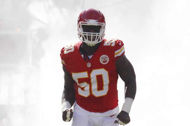 Kansas City Chiefs outside linebacker Justin Houston runs on to the field before an NFL football game against the St. Louis Rams at Arrowhead Stadium in Kansas City, Mo., Sunday, Oct. 26, 2014. (AP Photo/Colin E. Braley)
