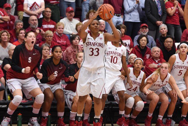November 17, 2014; Stanford, CA, USA; Stanford Cardinal guard Amber Orrange (33) shoots a three-point basket against the Connecticut Huskies during the second half at Maples Pavilion. The Cardinal defeated the Huskies 88-86. Mandatory Credit: Kyle Terada-USA TODAY Sports