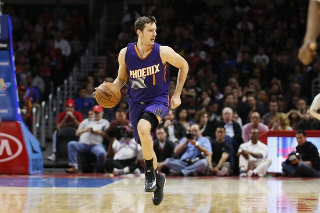 Phoenix Suns' Goran Dragic dribbles against the Los Angeles Clippers during the first half of an NBA basketball game Saturday, Nov. 15, 2014, in Los Angeles. (AP Photo/Danny Moloshok)