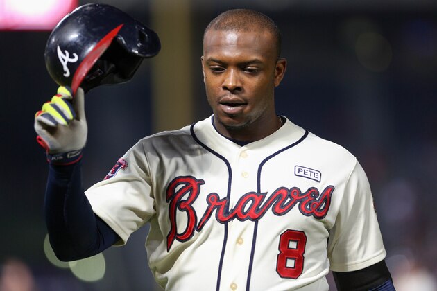 ATLANTA, GA - SEPTEMBER 20:  Justin Upton (8) of the Atlanta Braves reacts after grounding out during the 8th inning against the New York Mets at Turner Field on September 20, 2014 in Atlanta, Georgia. (Photo by Kevin Liles/Getty Images)