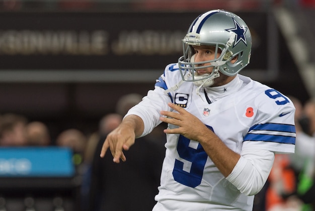 Nov 9, 2014; London, ENG; Dallas Cowboys quarterback Tony Romo (9) throws the ball prior to the game against the Jacksonville Jaguars at Wembley Stadium Mandatory Credit: Steve Flynn-USA TODAY Sports