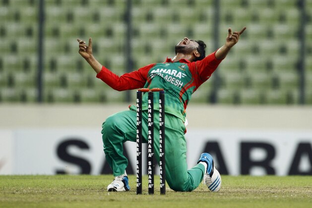 Bangladesh's Shakib Al Hasan reacts after his unsuccessful appeal for LBW during the third one-day International cricket match against India in Dhaka, Bangladesh, Thursday, June 19, 2014. (AP Photo/A.M. Ahad)