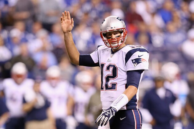 INDIANAPOLIS, IN - NOVEMBER 16:  Quarterback Tom Brady #12 of the New England Patriots signals a first down against the Indianapolis Colts during the third quarter of the game at Lucas Oil Stadium on November 16, 2014 in Indianapolis, Indiana.  (Photo by Andy Lyons/Getty Images)