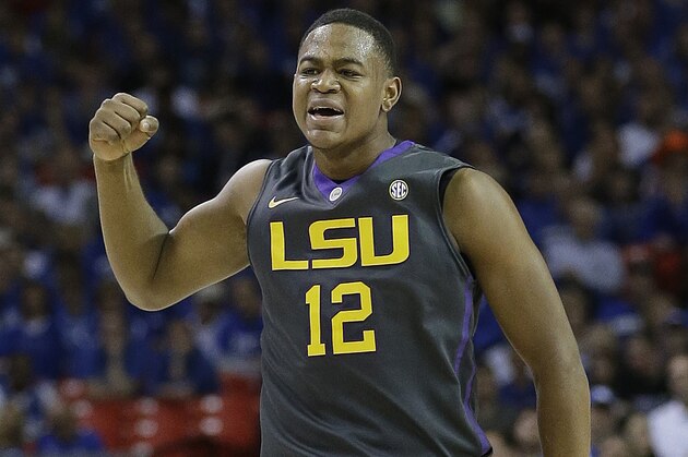 LSU forward Jarell Martin (12) celebrates a point against Kentucky during the first half of an NCAA college basketball game in the quarterfinal round of the Southeastern Conference men's tournament, Friday, March 14, 2014, in Atlanta. (AP Photo/Steve Helber)