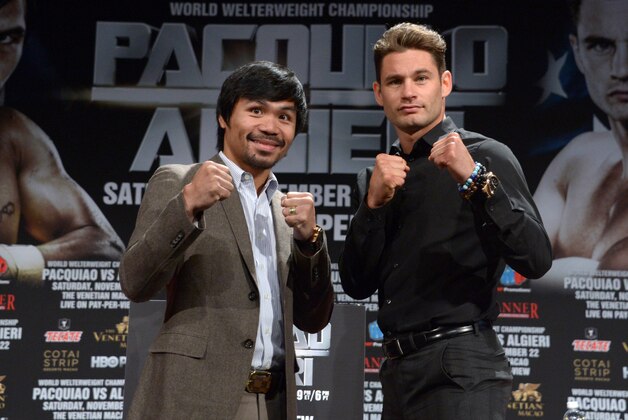 Sep 3, 2014; Los Angeles, CA, USA; Manny Pacquiao (left) and Chris Algieri pose at press conference at Hyatt Regency Century Plaza Hotel in advance of World Welterweight Championship bout on Nov. 22, 2014. Mandatory Credit: Kirby Lee-USA TODAY Sports