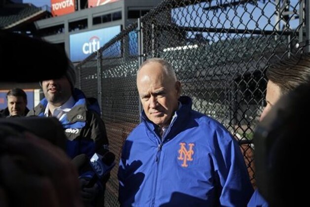 New York Mets general manager Sandy Alderson speaks to the media in the outfield of Citi Field in New York, Tuesday, Nov. 18, 2014. The Mets are moving their fences in at Citi Field for the second time. (AP Photo/Seth Wenig)