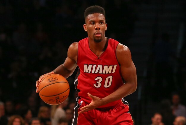 Nov 17, 2014; Brooklyn, NY, USA;  Miami Heat guard Norris Cole (30) advances the ball during the first quarter against the Brooklyn Nets at Barclays Center. Mandatory Credit: Anthony Gruppuso-USA TODAY Sports