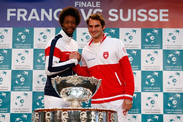 LILLE, FRANCE - NOVEMBER 20:  The second tie will be between Gael Monfils of France and Roger Federer of Switzerland at the draw during previews for the Davis Cup Tennis Final between France and Switzerland at the Place du Theatre on November 20, 2014 in Lille, France.  (Photo by Julian Finney/Getty Images)