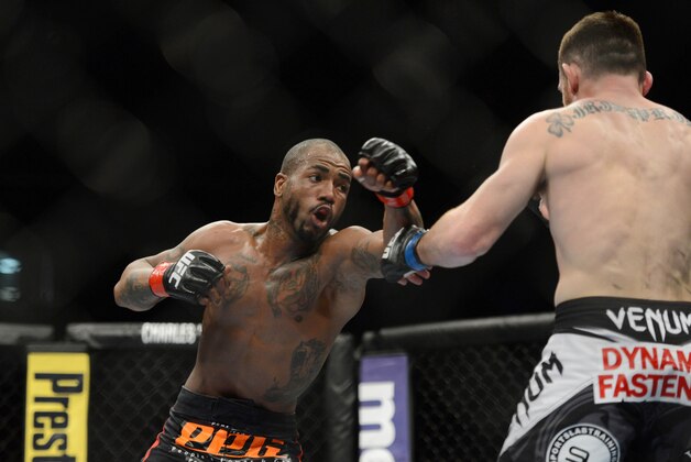 December 14, 2013; Sacramento, CA, USA; Bobby Green (red gloves) fights Pay Healy (blue gloves) during the lightweight bout of the UFC on FOX 9 at Sleep Train Arena. Mandatory Credit: Kyle Terada-USA TODAY Sports