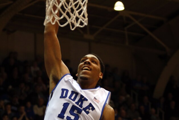 Duke's Jahlil Okafor (15) dunks the ball during the second half of an NCAA college basketball game against the Presbyterian in Durham, N.C., Friday, Nov. 14, 2014. (AP Photo/Karl B DeBlaker)