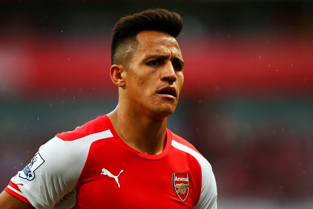 LONDON, ENGLAND - OCTOBER 18:  Alexis Sanchez of Arsenal looks on during the Barclays Premier League match between Arsenal and Hull City at Emirates Stadium on October 18, 2014 in London, England.  (Photo by Clive Rose/Getty Images)