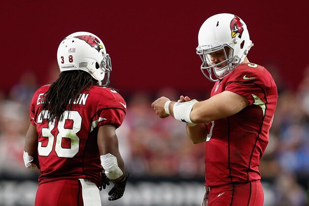GLENDALE, AZ - NOVEMBER 16:  Quarterback Drew Stanton #5 (R) of the Arizona Cardinals and running back Andre Ellington #38 (L) during the NFL game against the Detroit Lions at the University of Phoenix Stadium on November 16, 2014 in Glendale, Arizona.  The Cardinals defeated the Lions 14-6.  (Photo by Christian Petersen/Getty Images)