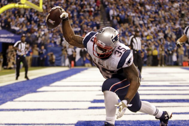 New England Patriots running back Jonas Gray celebrates a touchdown against the Indianapolis Colts during the second half of an NFL football game in Indianapolis, Sunday, Nov. 16, 2014. (AP Photo/AJ Mast)