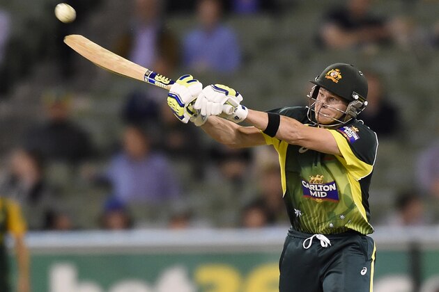 Australia's Steven Smith hits a boundary during the fourth one day international cricket match against South Africa in Melbourne, Australia, Friday, Nov. 21, 2014. (AP Photo/Andy Brownbill)