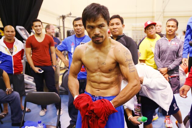 MACAU - NOVEMBER 21:  Manny Pacquiao poses during a workout session at The Venetianon November 21, 2014 in Macau, Macau.  (Photo by Chris Hyde/Getty Images)