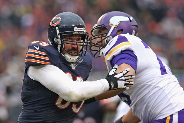 CHICAGO, IL - NOVEMBER 16:  Jared Allen #69 of the Chicago Bears rushes against Michael Harris #79 of the Minnesota Vikings at Soldier Field on October 19, 2014 in Chicago, Illinois. The Bears defeated the Vikings 21-13.  (Photo by Jonathan Daniel/Getty Images)