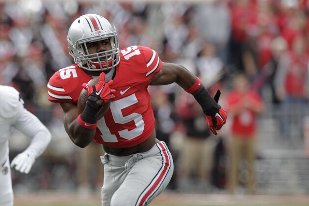 Ohio State running back Ezekiel Elliott plays against Kent State during an NCAA college football game Saturday, Sept. 13, 2014, in Columbus, Ohio. (AP Photo/Jay LaPrete)