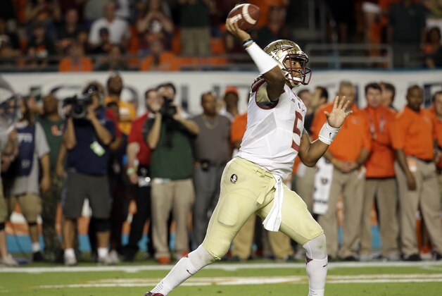 Florida State quarterback Jameis Winston passes in the first half an NCAA college football game against Miami, Saturday, Nov. 15, 2014, in Miami Gardens, Fla. (AP Photo/Lynne Sladky)