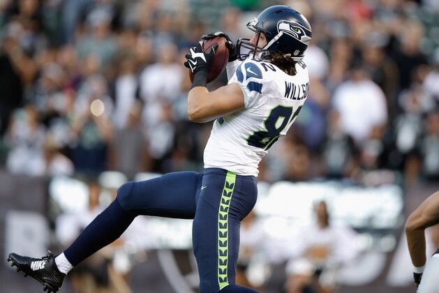 OAKLAND, CA - AUGUST 28: Tight end Luke Willson #82 of the Seattle Seahawks catches a pass for a touchdown against the Oakland Raiders during a preseason game at O.co Coliseum on August 28, 2014 in Oakland, California.  (Photo by Ezra Shaw/Getty Images)