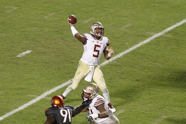 MIAMI GARDENS, FL - NOVEMBER 15: Jameis Winston #5 of the Florida State Seminoles throws the ball against the Miami Hurricanes during third quarter action on November 15, 2014 at Sun Life Stadium in Miami Gardens, Florida. The Seminoles defeated the Hurricanes 30-26. (Photo by Joel Auerbach/Getty Images)