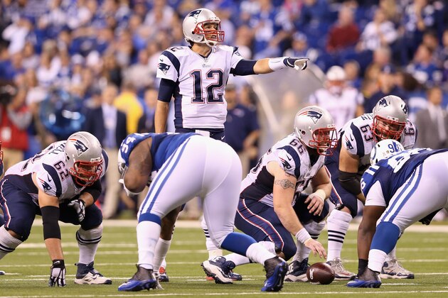 INDIANAPOLIS, IN - NOVEMBER 16:  Quarterback Tom Brady #12 of the New England Patriots reacts against the Indianapolis Colts during the game at Lucas Oil Stadium on November 16, 2014 in Indianapolis, Indiana.  (Photo by Andy Lyons/Getty Images)